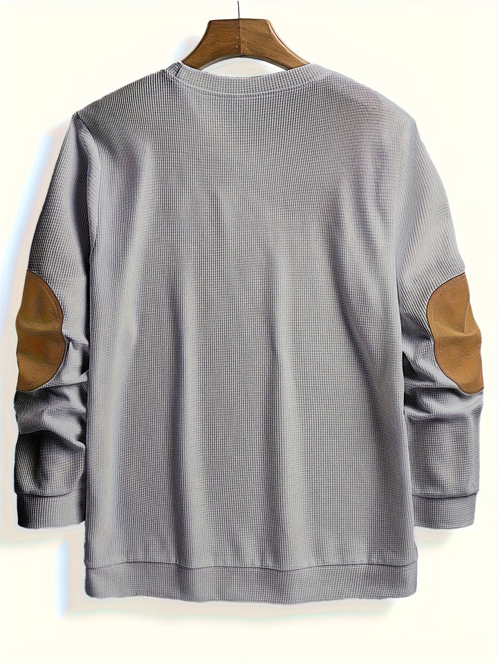 Thibault | Pull texturé à col rond et empiècements contrastés