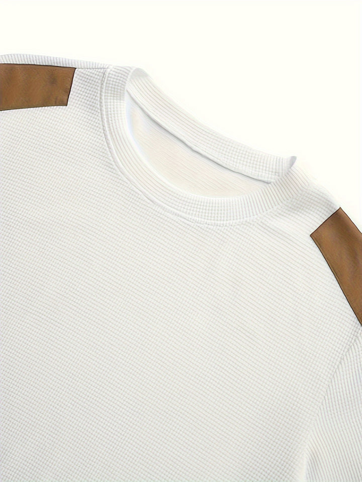 Thibault | Pull texturé à col rond et empiècements contrastés
