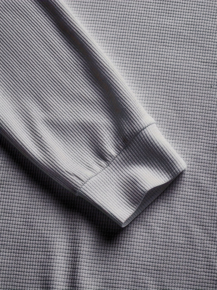 Thibault | Pull texturé à col rond et empiècements contrastés