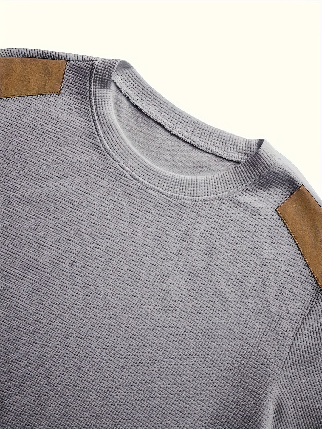 Thibault | Pull texturé à col rond et empiècements contrastés